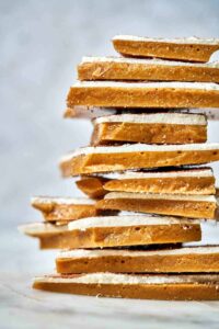 Front view of a stack of Toffee layered with white chocolate.