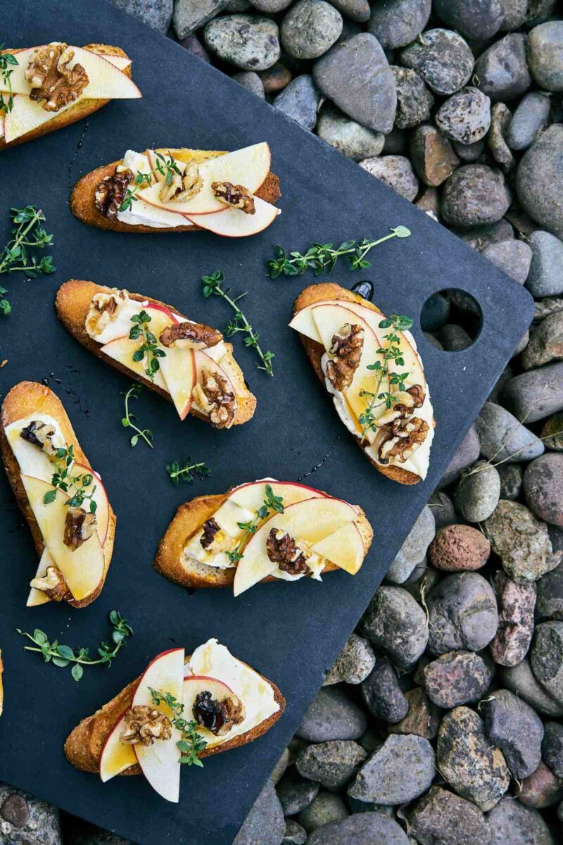 Apple Brie Crostini with Walnuts, Honey, & Thyme - Proportional Plate