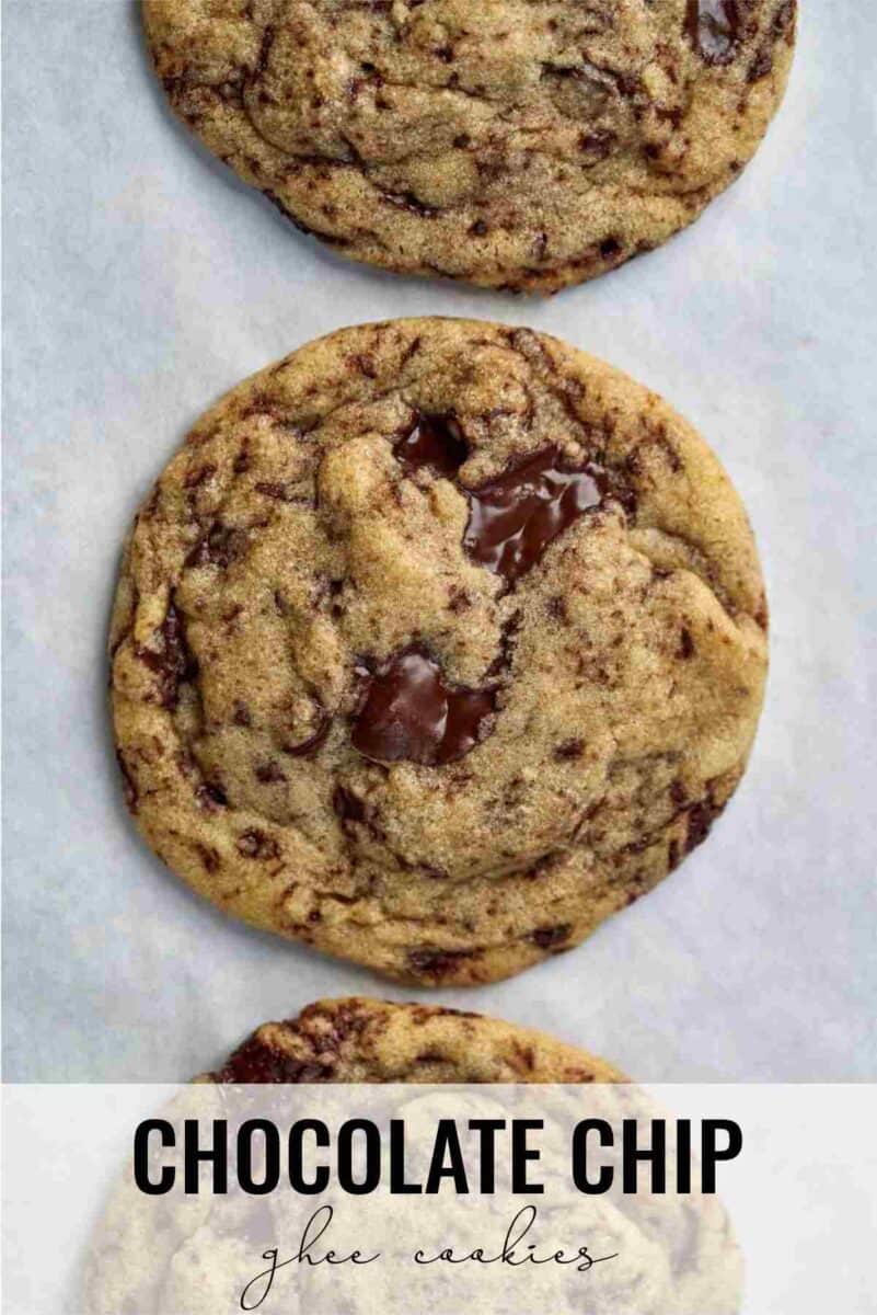 Three cookies on parchment.