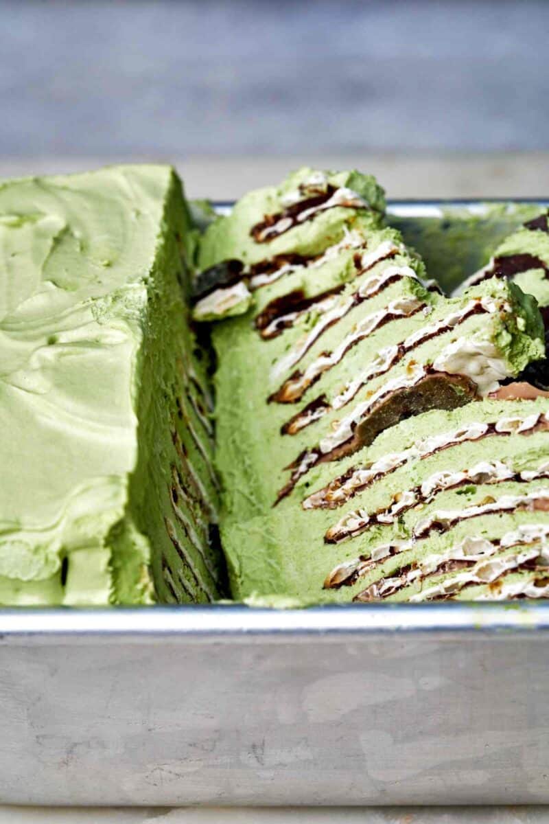 Green ice box cake in a tin.