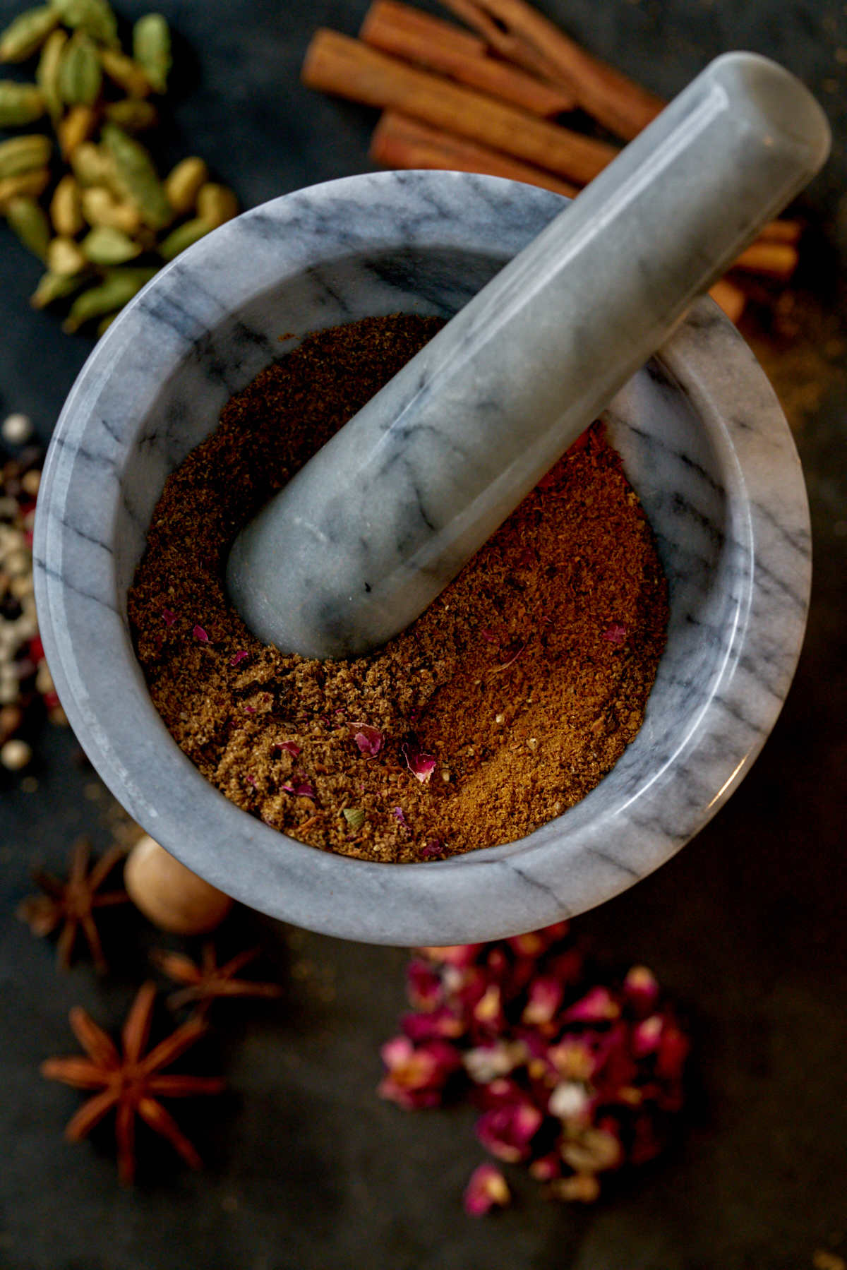 Spices in a mortar and pestle.
