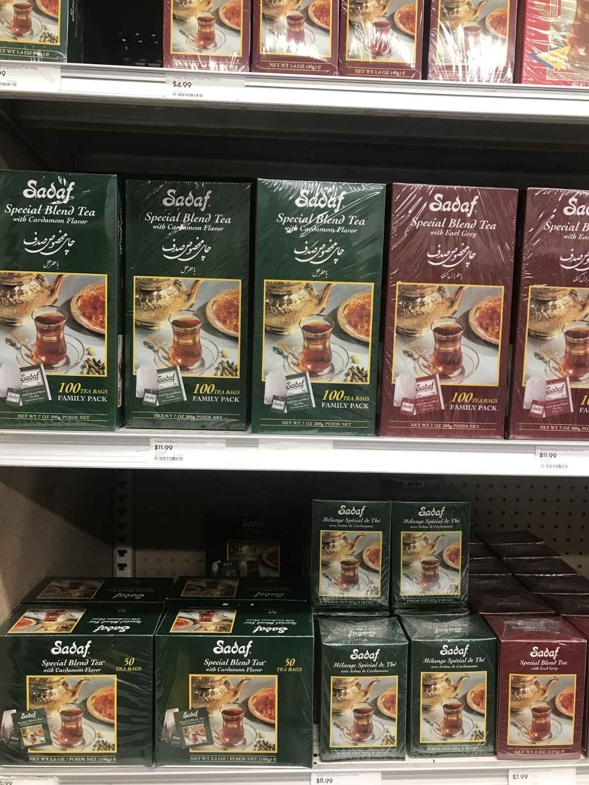 Boxes of tea on a shelf.