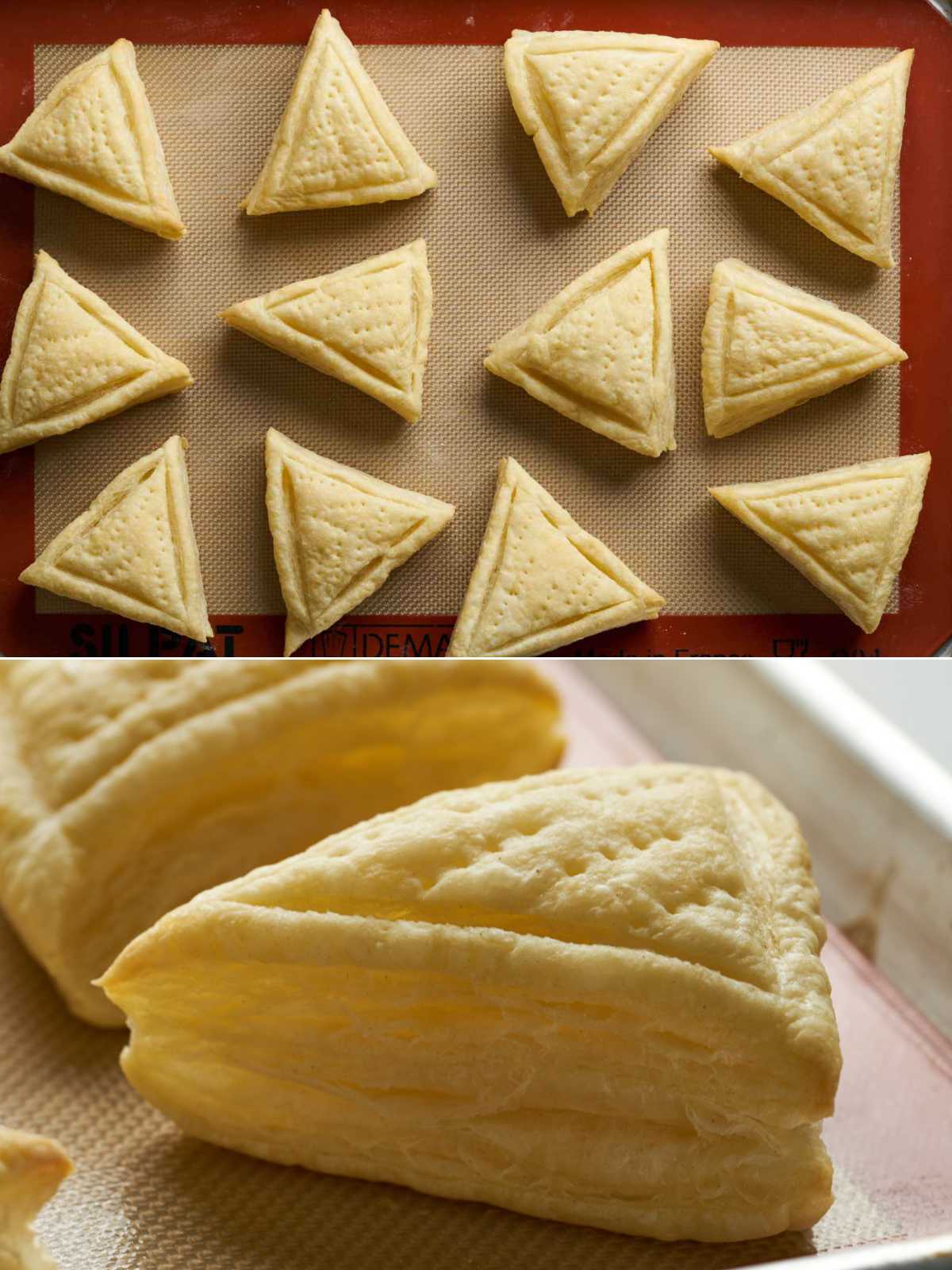 Freshly baked puff pastry traingles on a baking sheet.