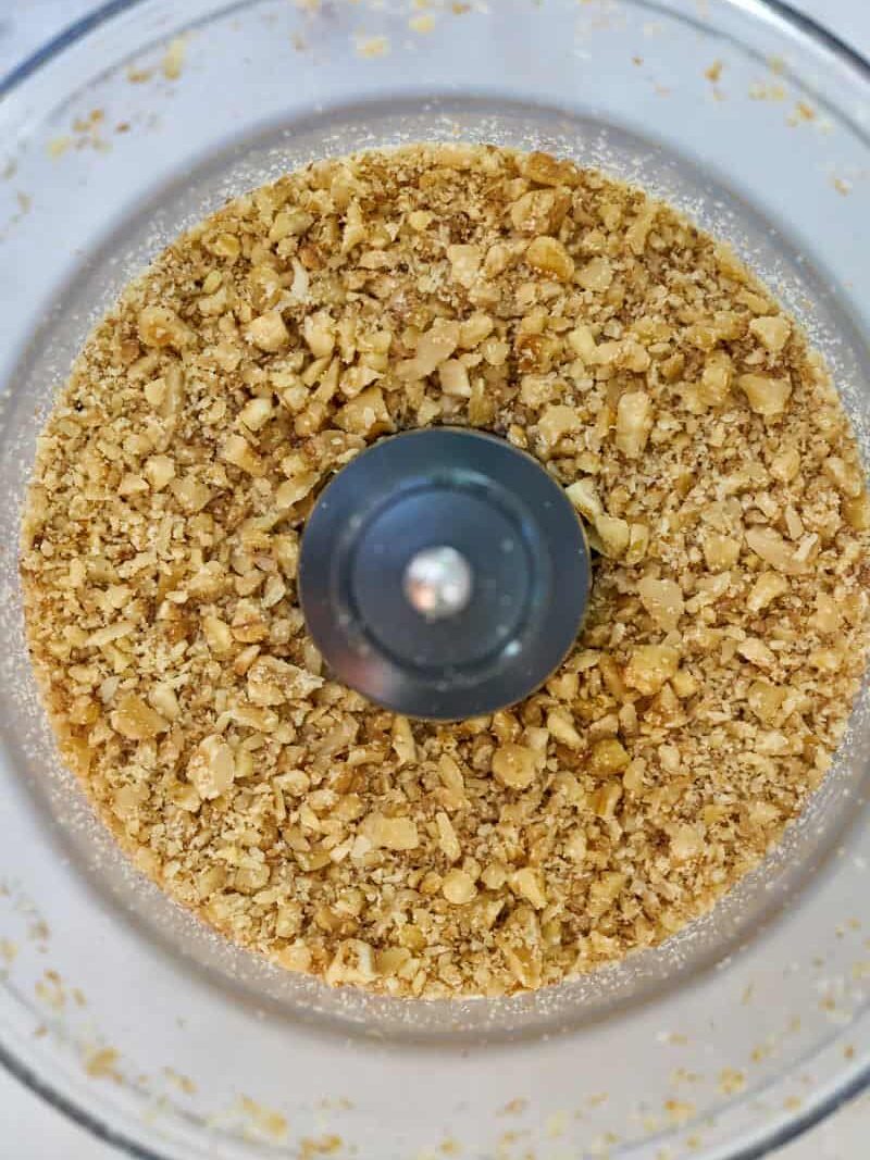 Consistency of walnuts in a food processor.