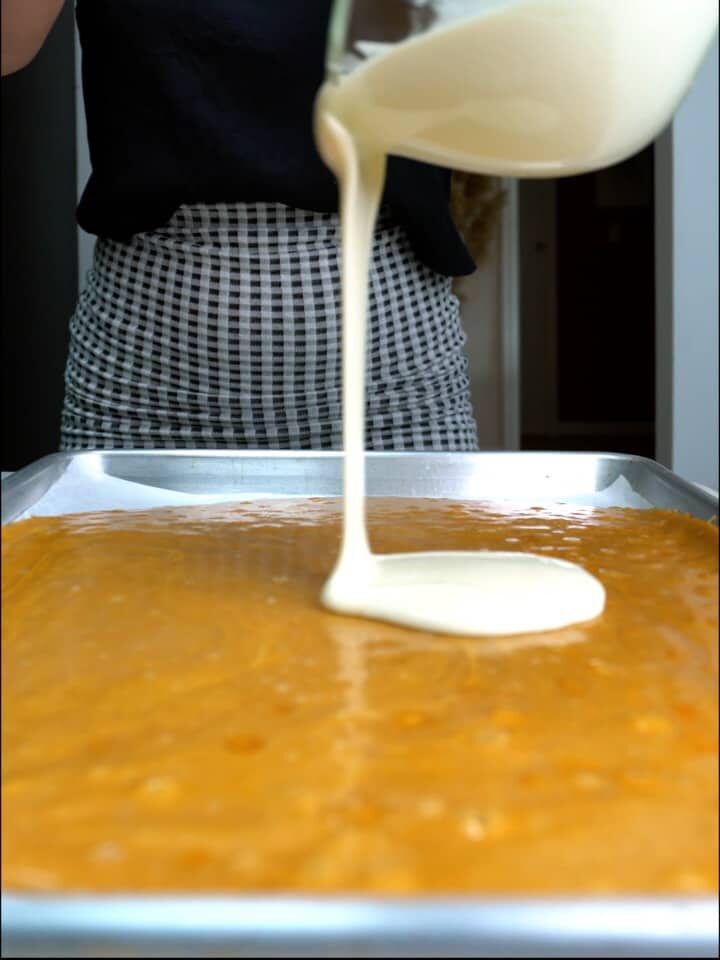 Pouring white chocolate.