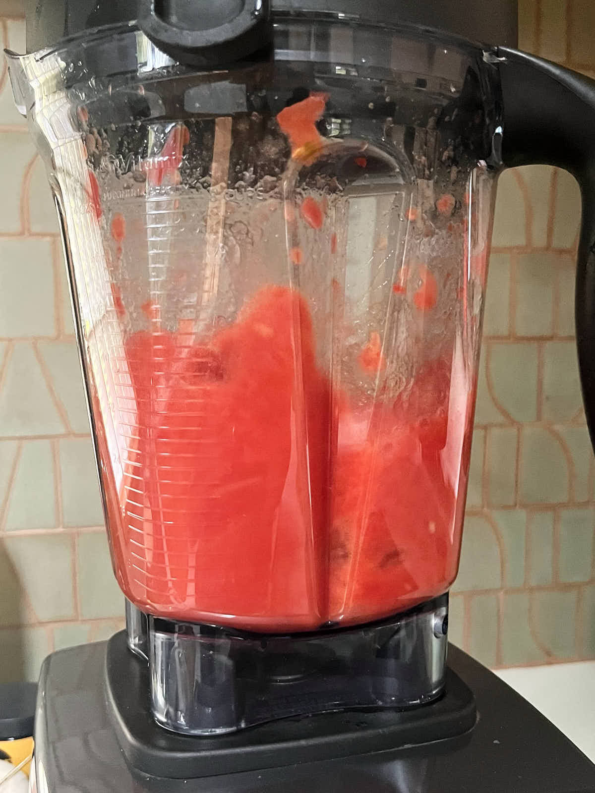 Blender running with red juice.