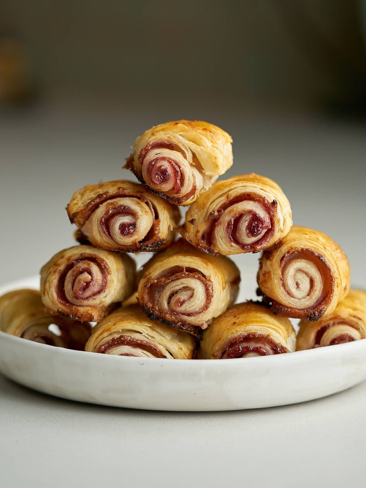 Flaky pastry rolls will jam stacked in a pyramid.