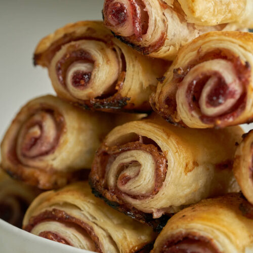 Flaky pastry rolls will jam stacked in a pyramid.