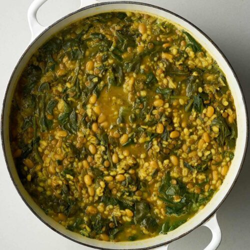 A large pot of yellow and green bean soup.