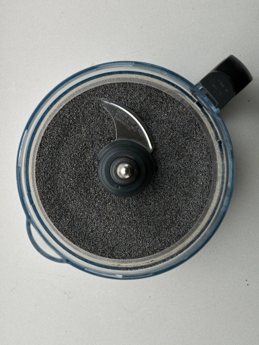 Poppyseeds in the bowl of a food processor.