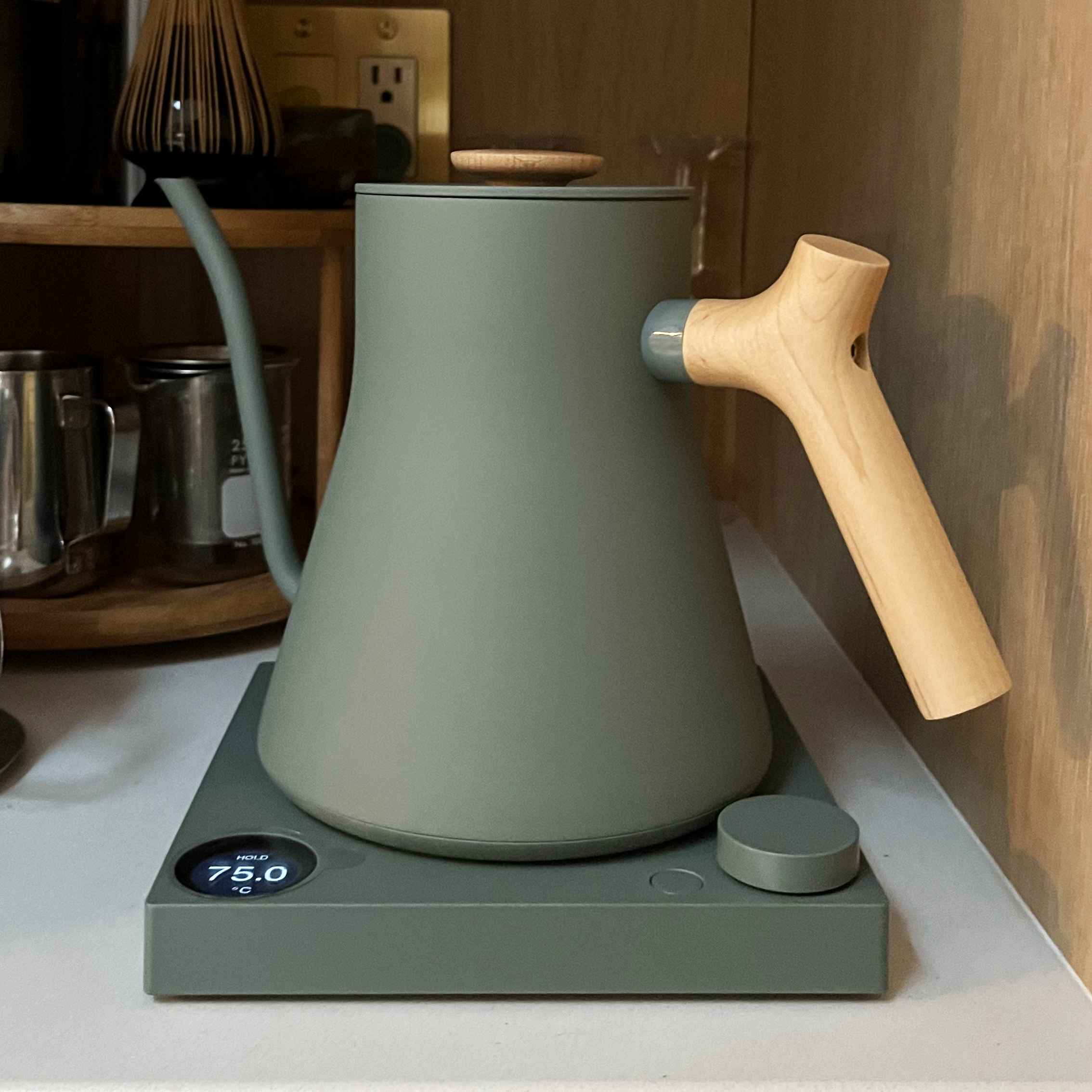 Sage electric kettle in a tea nook.